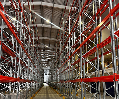 warehouse shelving units with red accents designed for optimal storage and organization of items in a modern inventory system 4 storage solutions 4 shelving systems 4 management techniques